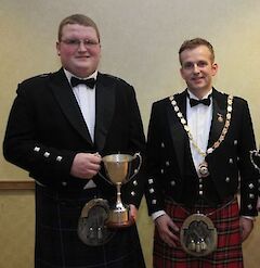 Martyn Nicolson receiving the Scottish Plant Owners Association trophy.